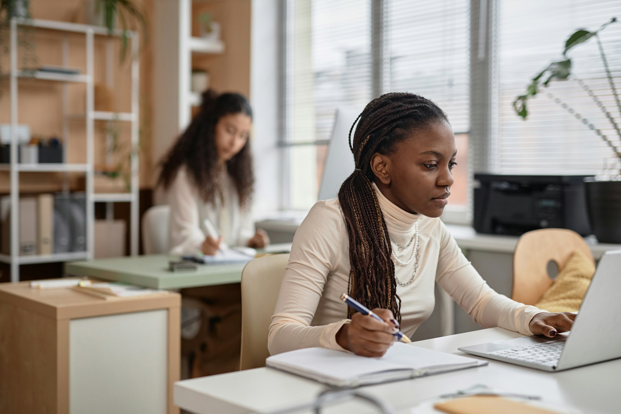 Black Girl Using Laptop for Study in Office